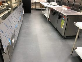 Concrete flooring in a commercial kitchen.